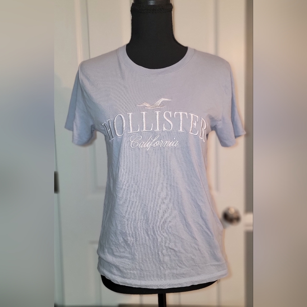 Hollister Women's Pale Blue Embroidered Logo Tee